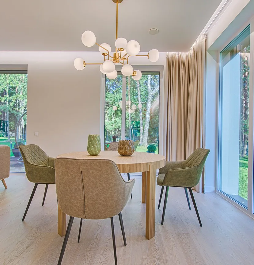 A light-filled dining room looking out to a garden